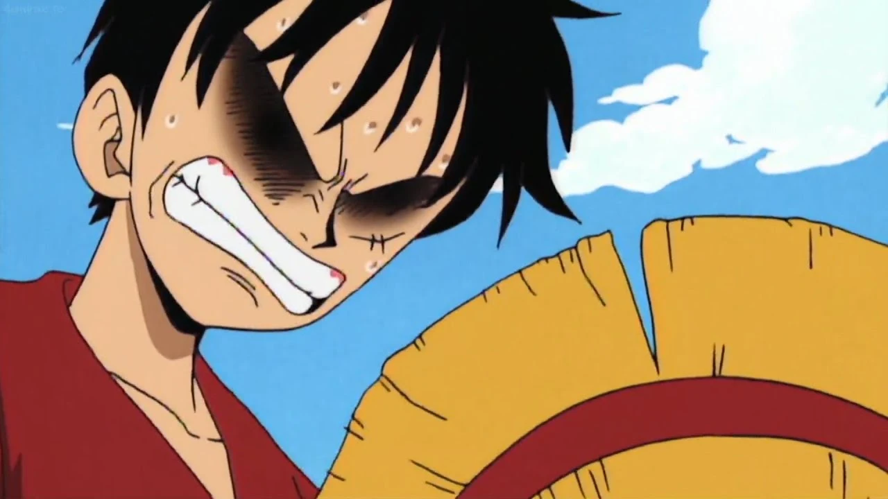 Luffy's hat gets torn by Buggy